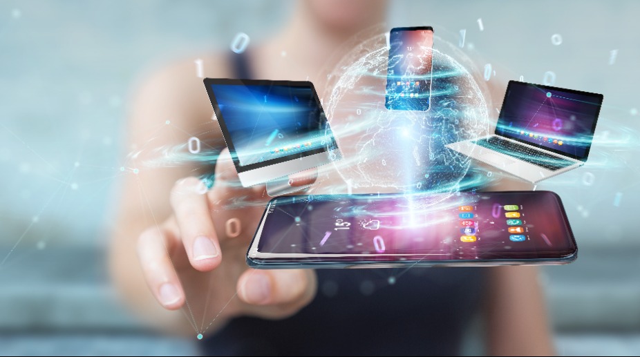 Modern devices connected to each other in businesswoman hand 3D rendering